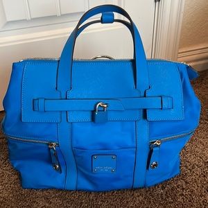 Blue Henri Bendel tote with original sack, storage bag and papers